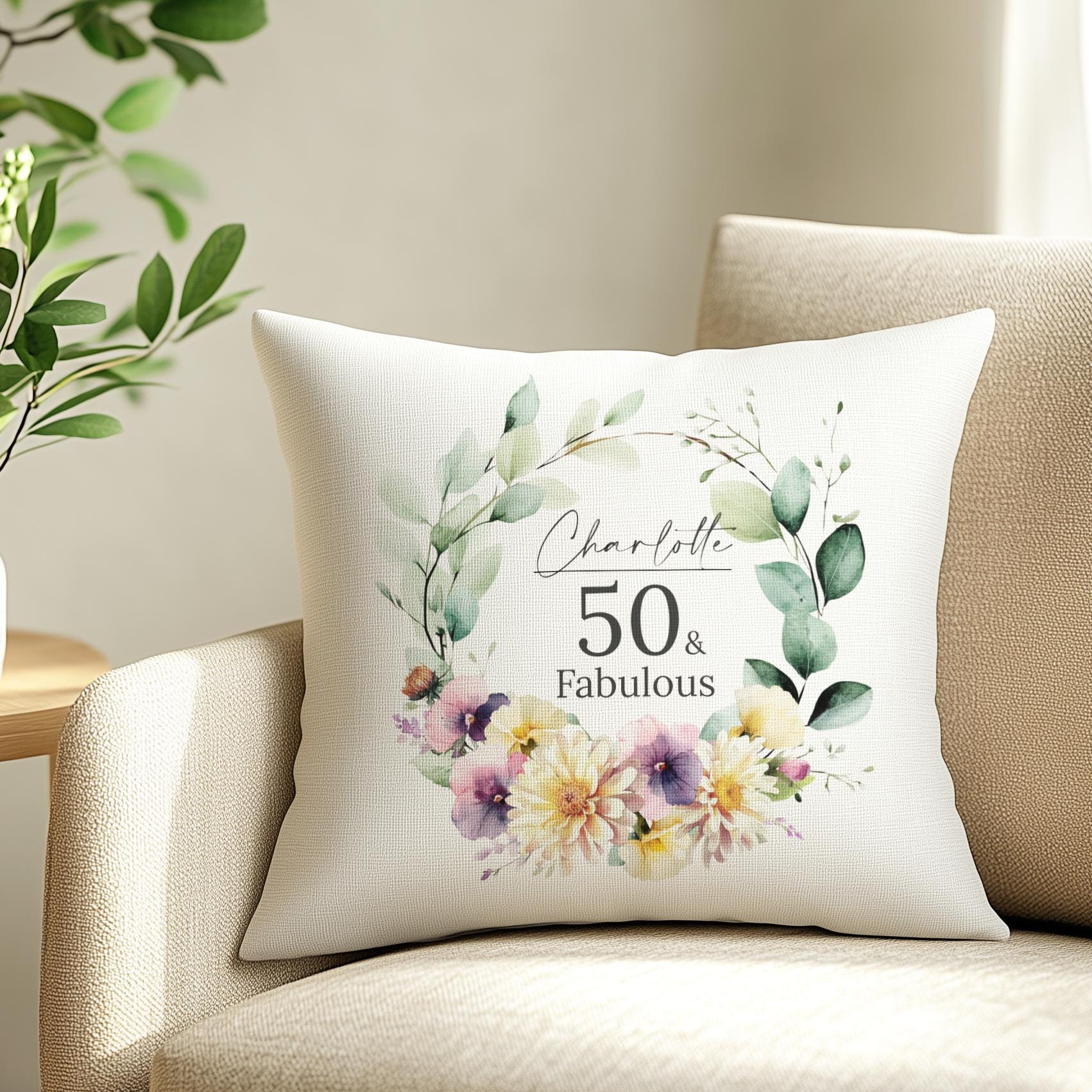 Display of a personalised 50th birthday cushion, representing the full collection of custom cushions available for all life milestones.