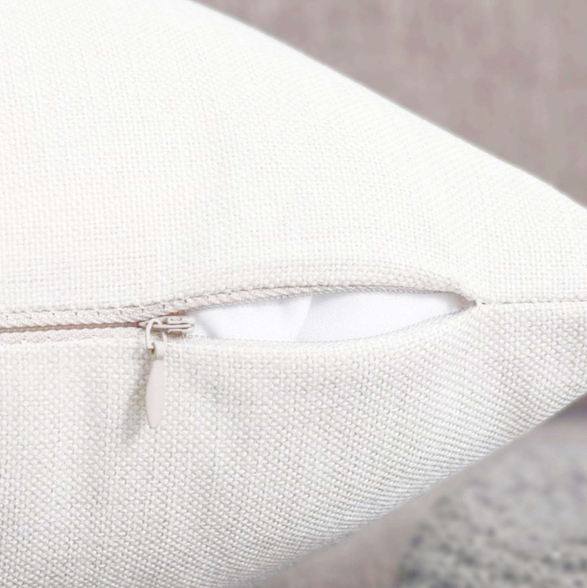 Close-up of cushion fabric showing texture and invisible bottom zip for easy removal