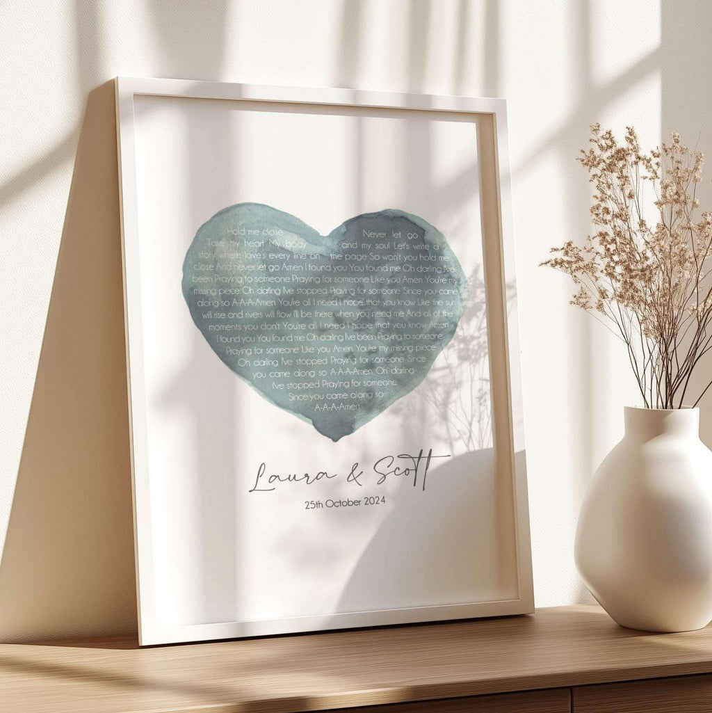 Personalised print featuring song lyrics inside a watercolour heart, customised with names and a wedding or anniversary date