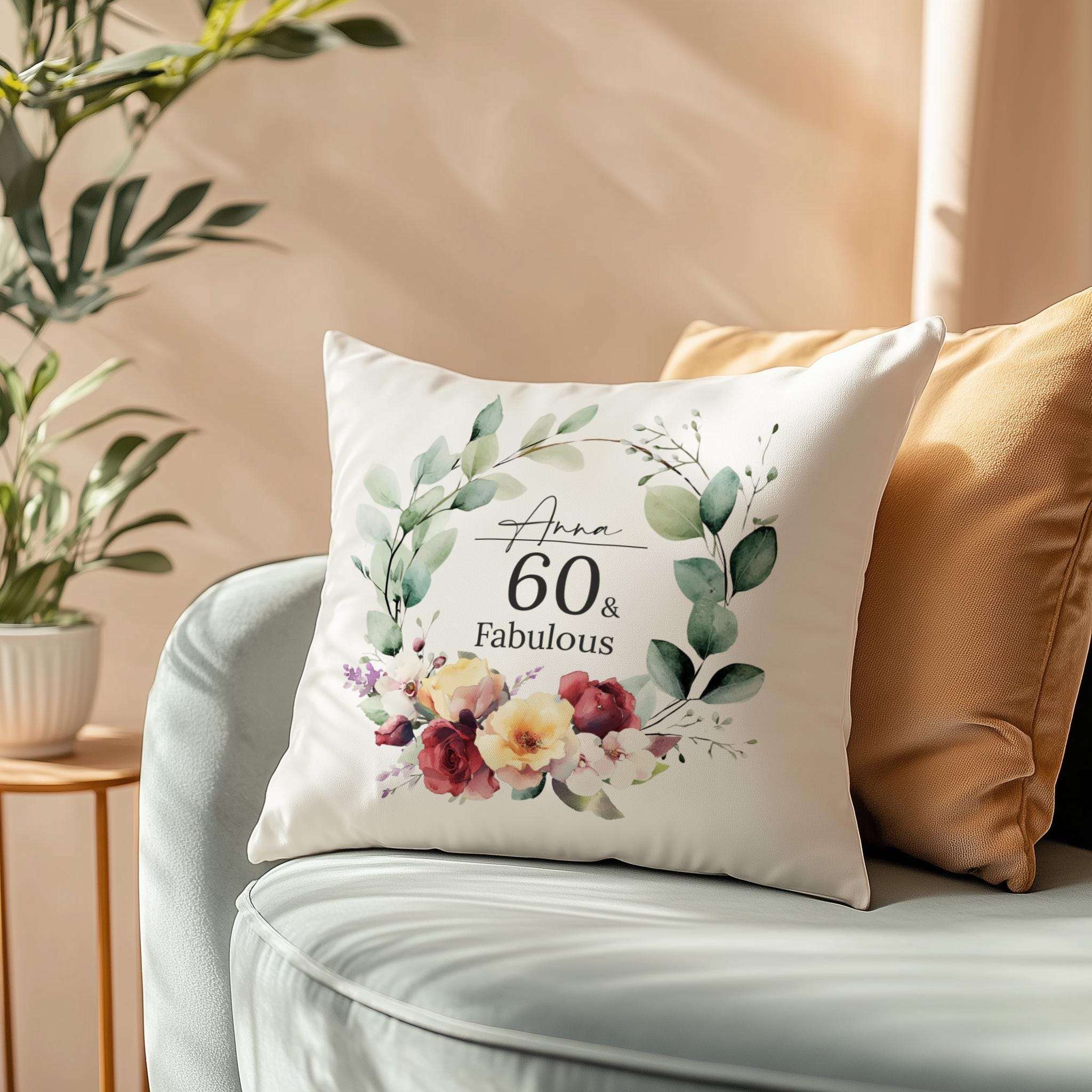 Personalised 60th birthday cushion with a watercolour birth month flower bouquet, roses, and orchids