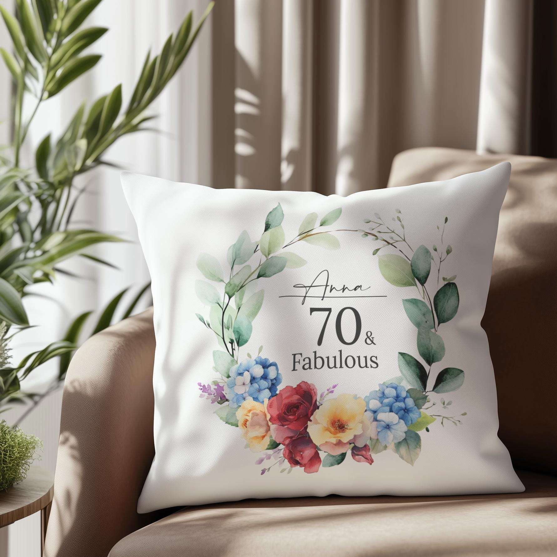 Personalised 70th birthday cushion with an elegant watercolour birth month flower design, hydrangeas, and roses