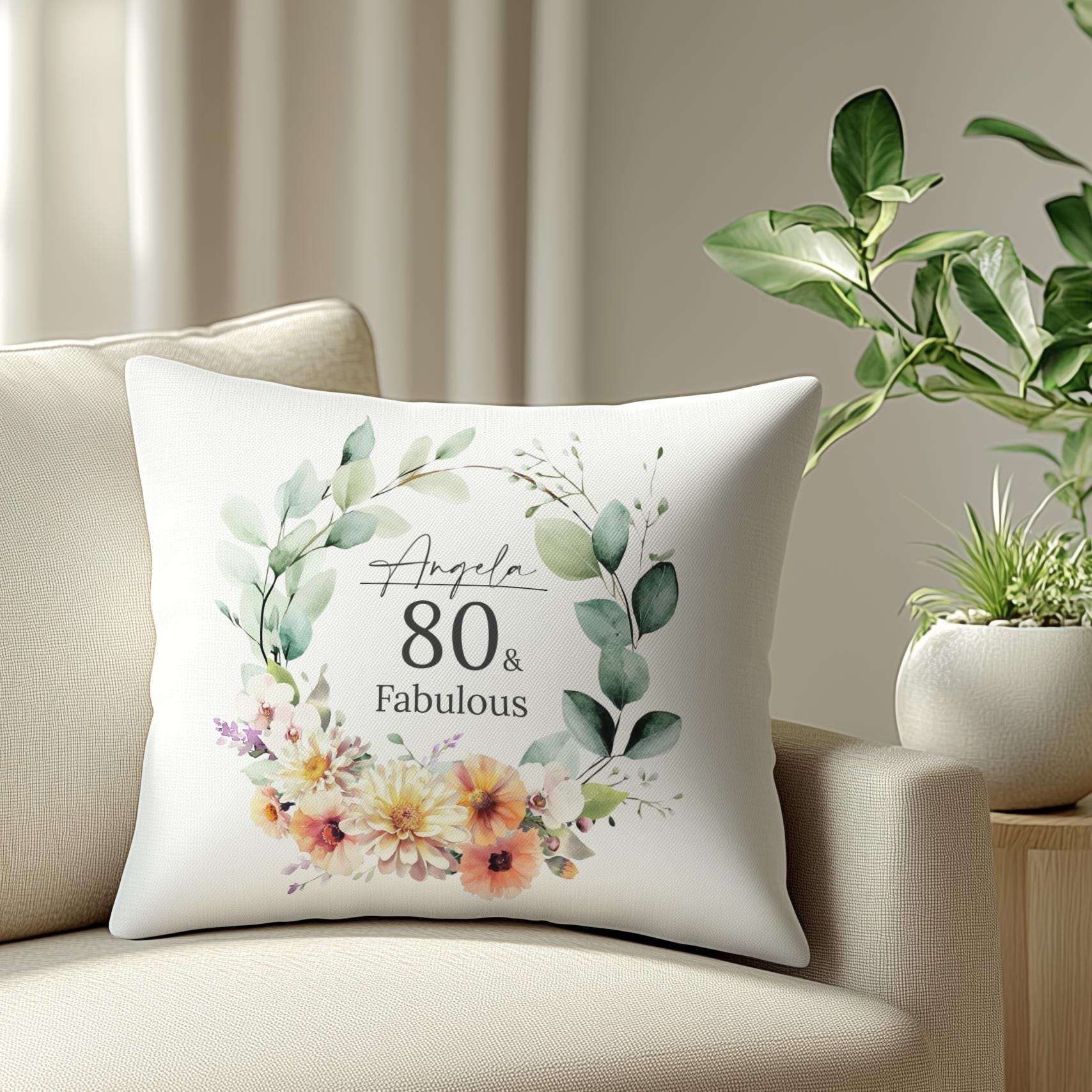 Personalised 80th birthday cushion with an elegant watercolour birth month flower design, chrysanthemums, and orchids