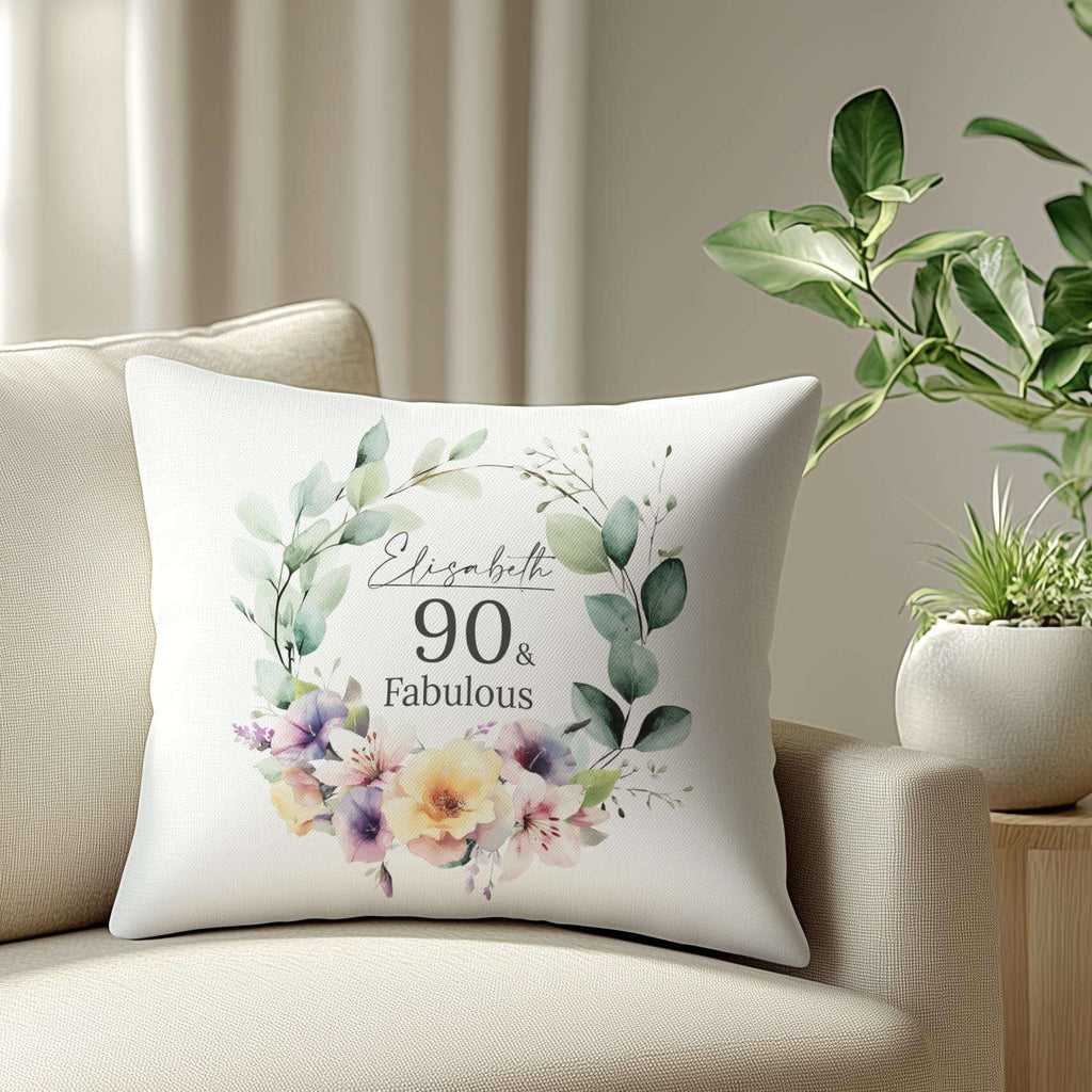 Personalised 90th birthday cushion with an elegant watercolour birth month flower design, roses, and lilies