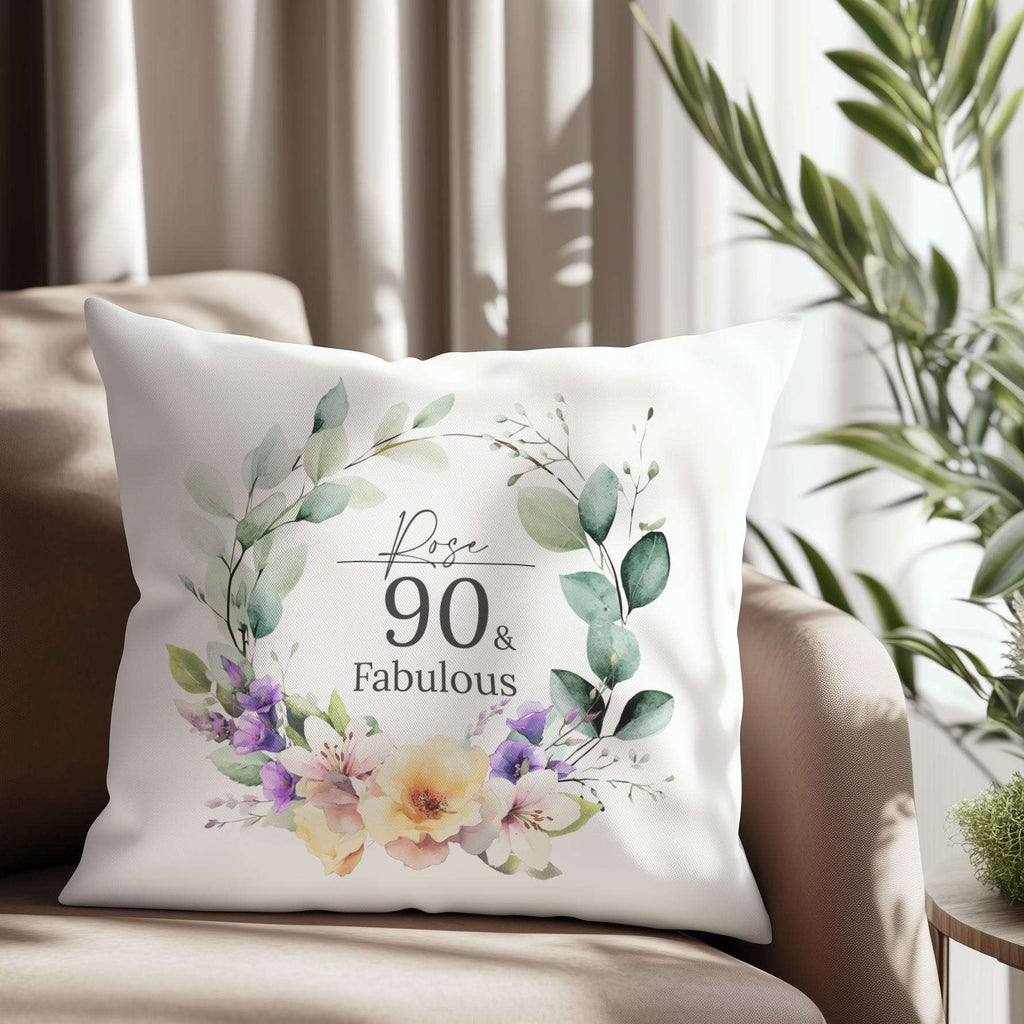 Personalised 90th birthday cushion with an elegant watercolour birth month flower design, roses, and lilies