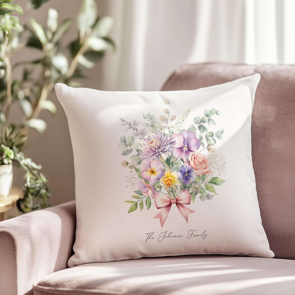 Personalised family cushion featuring a delicate bouquet of birth month flowers with custom names and family surname