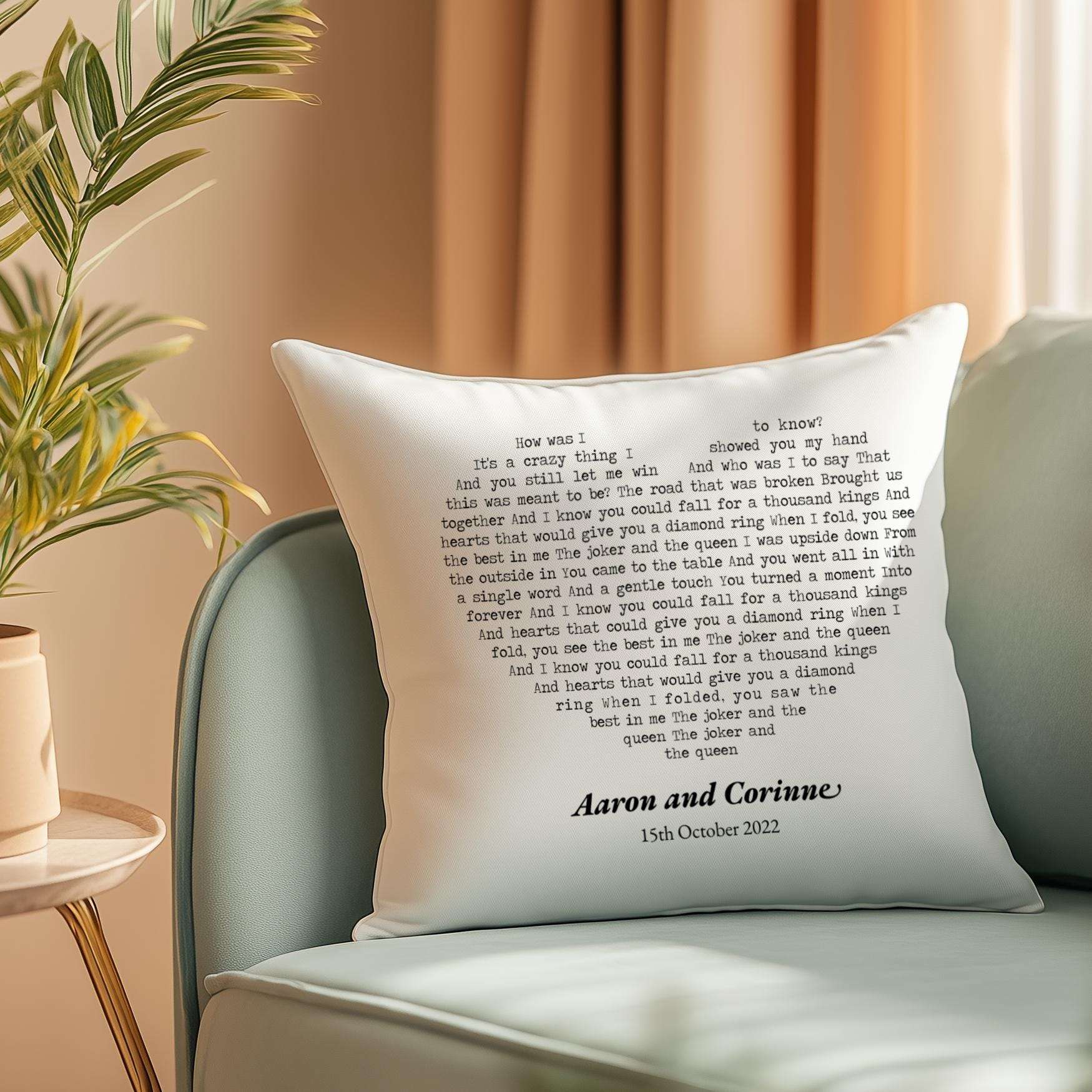 Personalised cushion featuring custom first dance song lyrics on natural fabric, with couple's names and date