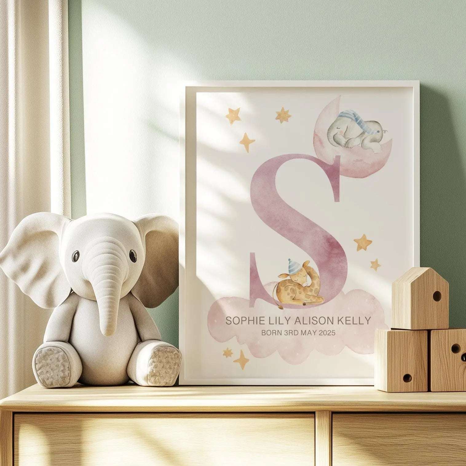Personalised nursery print featuring two watercolour sleeping animals, soft clouds, and stars, ready for framing