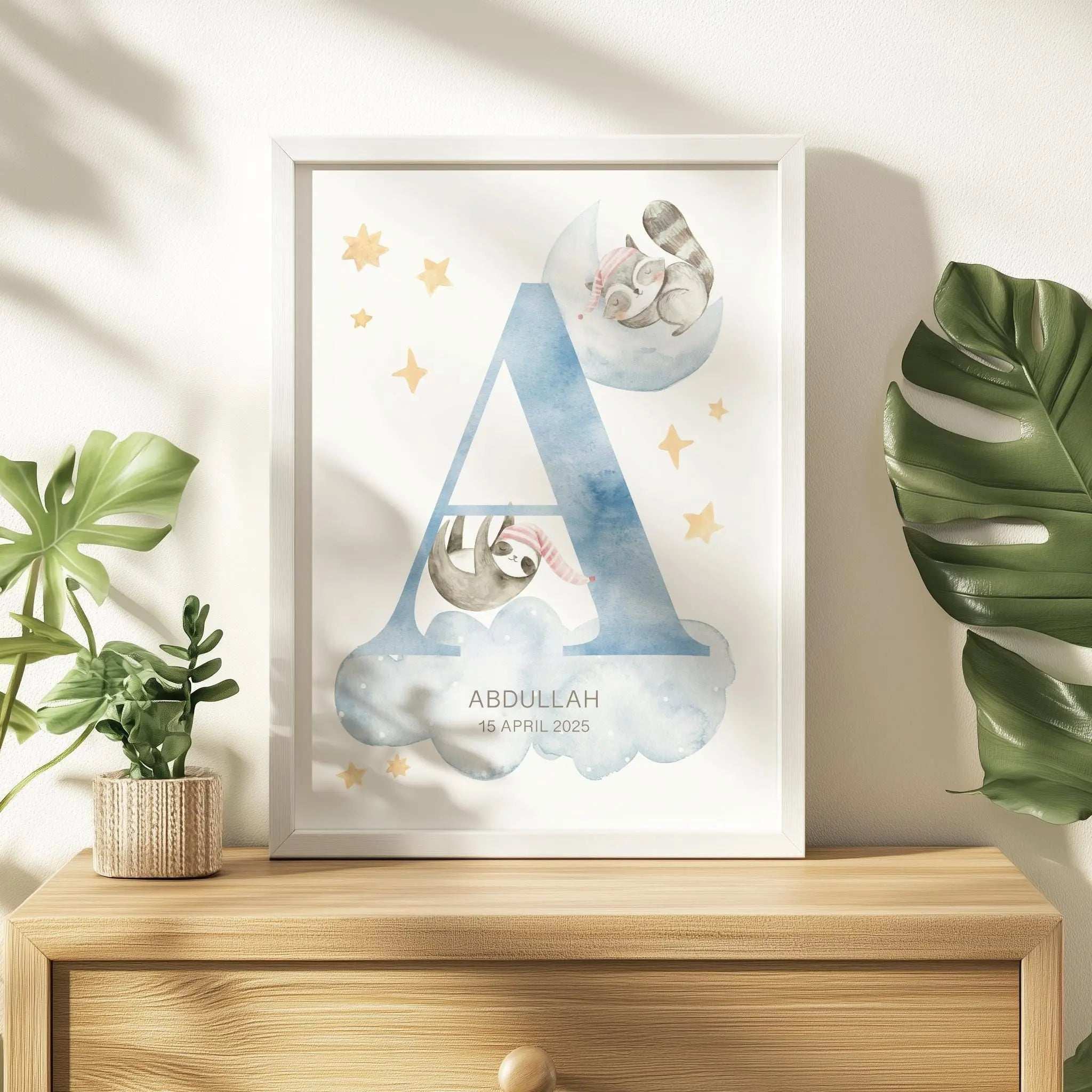 Personalised nursery print featuring two watercolour sleeping animals, soft clouds, and stars, ready for framing