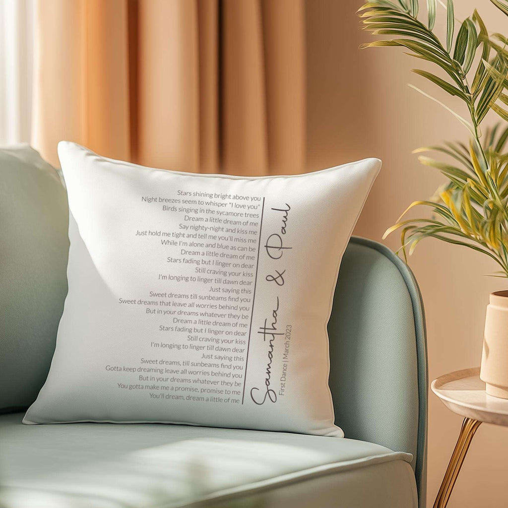 Personalised cushion featuring custom first dance song lyrics in an elegant spiral design, with couple's names and date