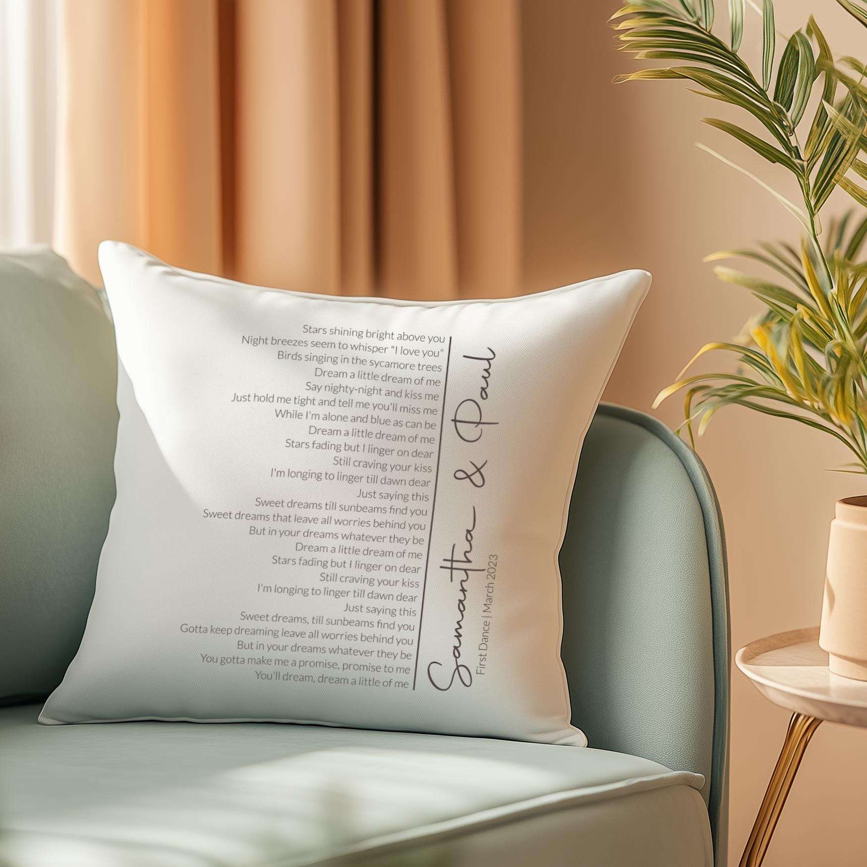 Personalised cushion featuring custom first dance song lyrics in an elegant spiral design, with couple's names and date