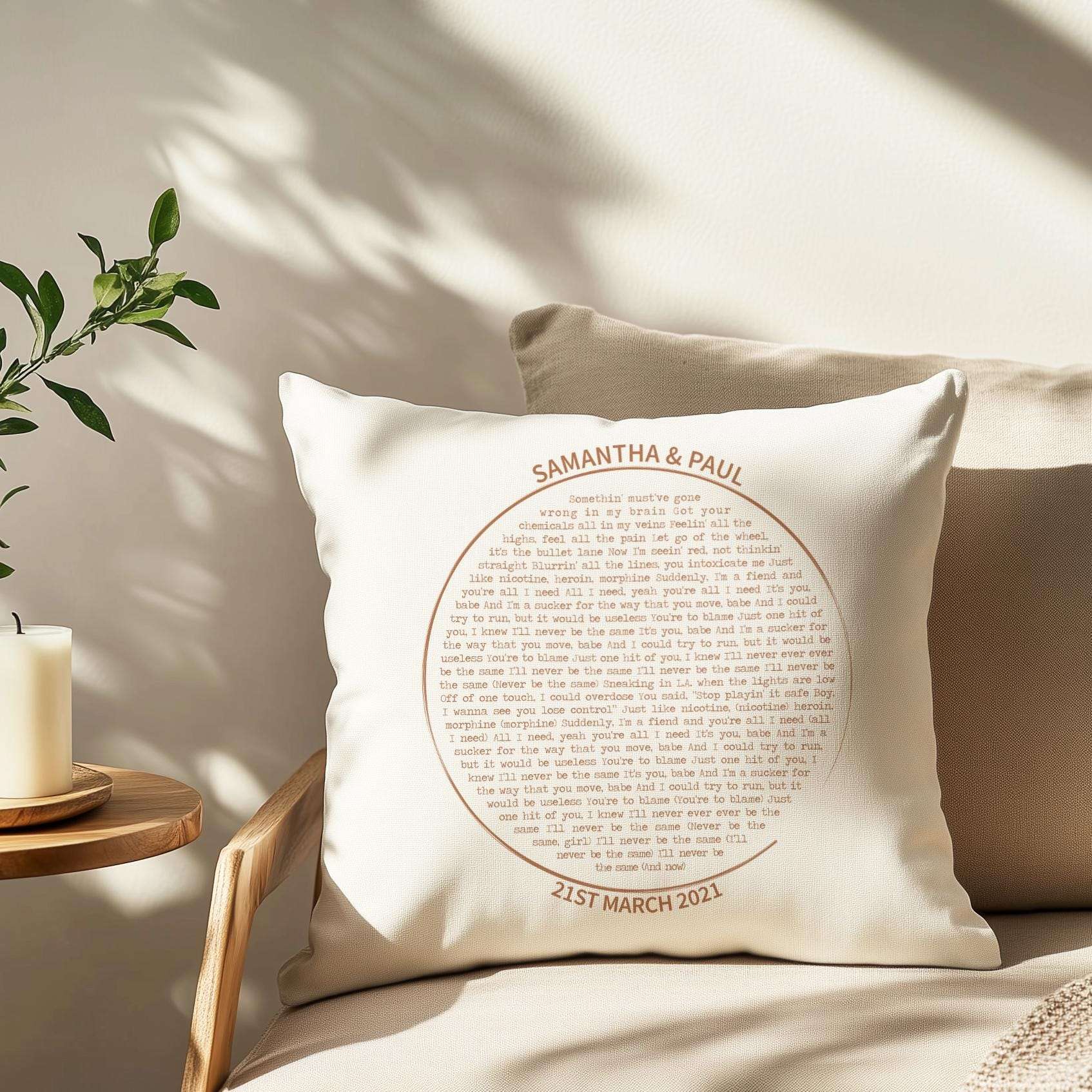 Personalised cushion featuring custom song lyrics in a spiral vinyl record design, with couple's names and date