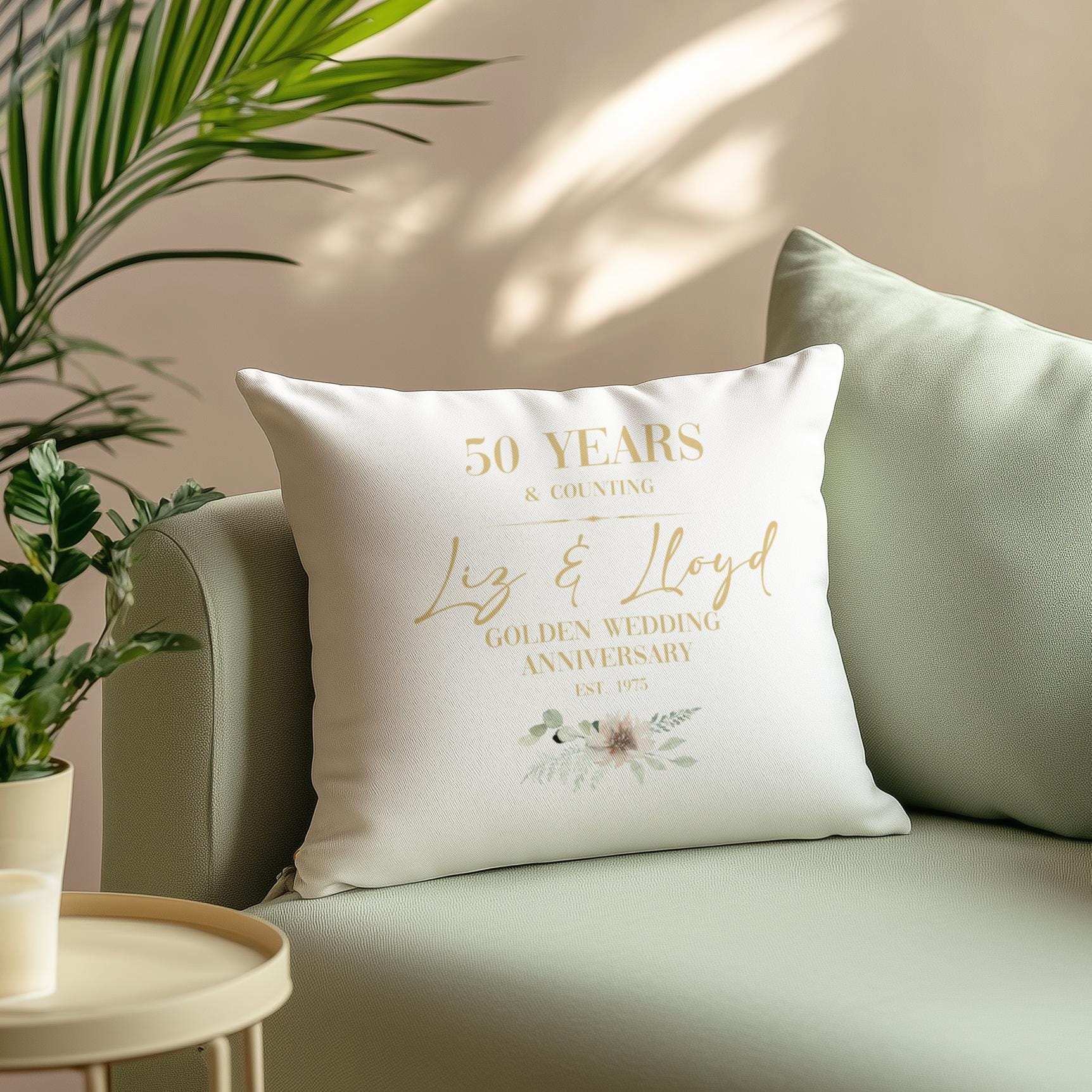 Personalised golden 50th wedding anniversary cushion for a couple, customised with names and a significant date
