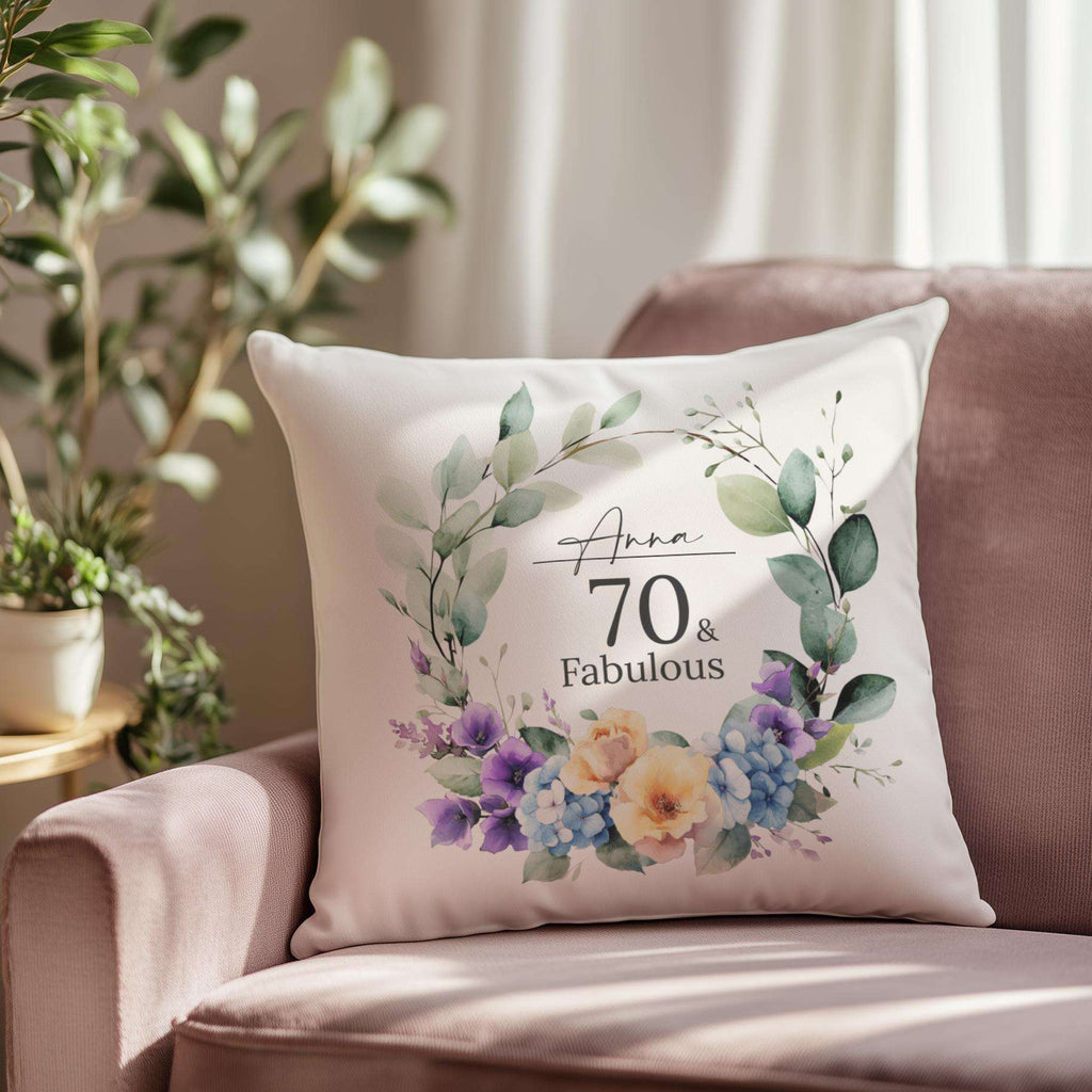 Personalised 70th birthday cushion with an elegant watercolour birth month flower design, hydrangeas, and roses