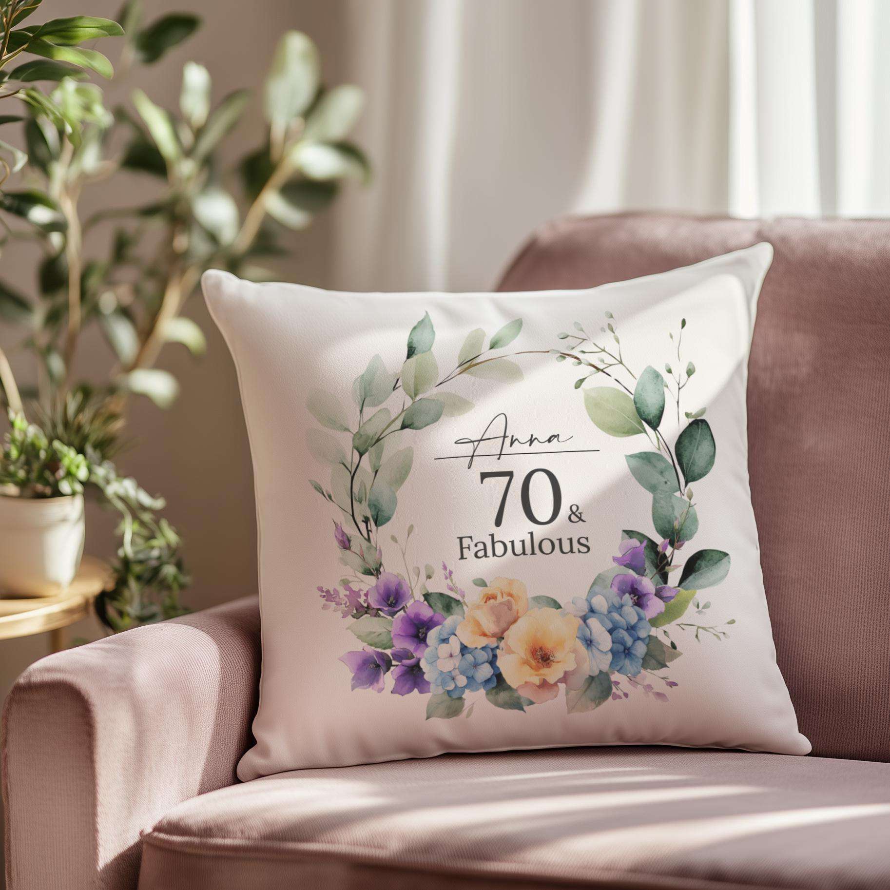Personalised 70th birthday cushion with an elegant watercolour birth month flower design, hydrangeas, and roses