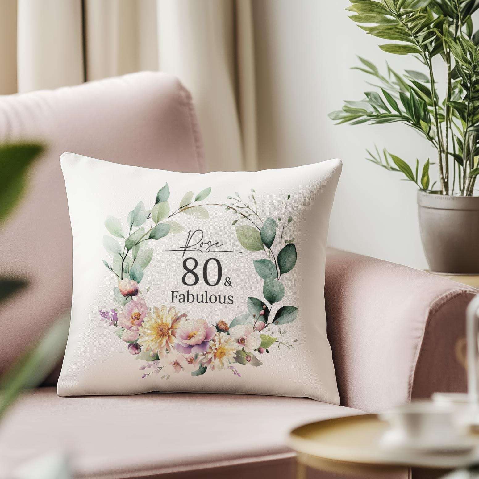 Personalised 80th birthday cushion with an elegant watercolour birth month flower design, chrysanthemums, and orchids