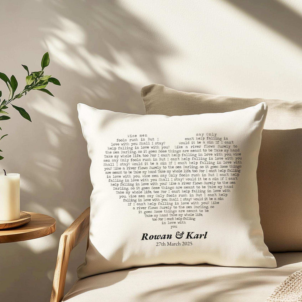Personalised cushion featuring custom first dance song lyrics on natural fabric, with couple's names and date
