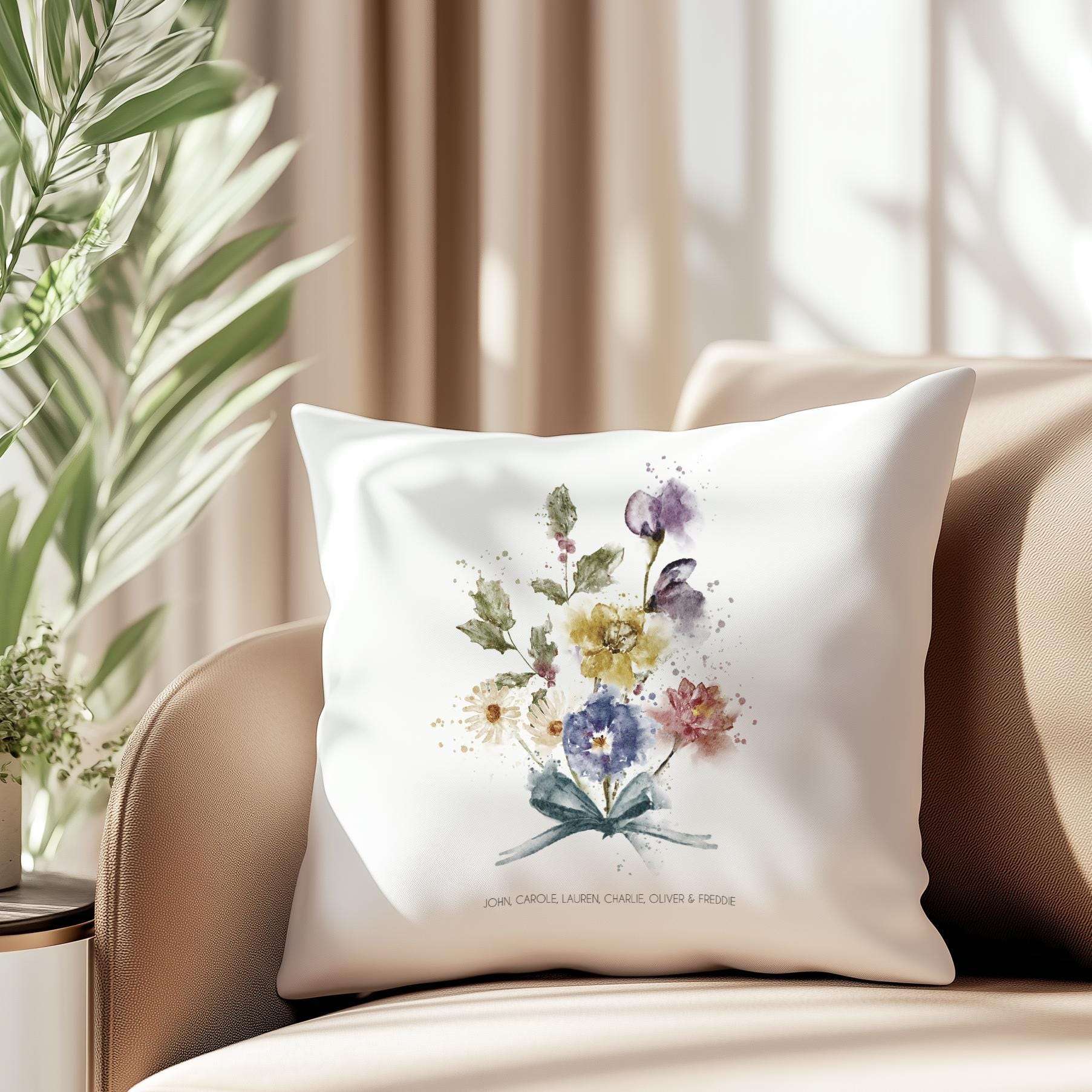 Personalised family cushion featuring a watercolour bouquet of birth month flowers with family and individual names