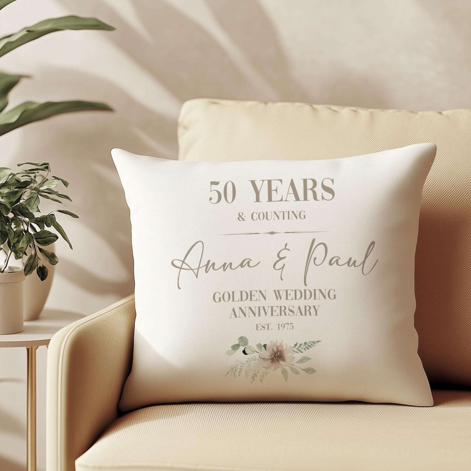 Personalised golden 50th wedding anniversary cushion for a couple, customised with names and a significant date