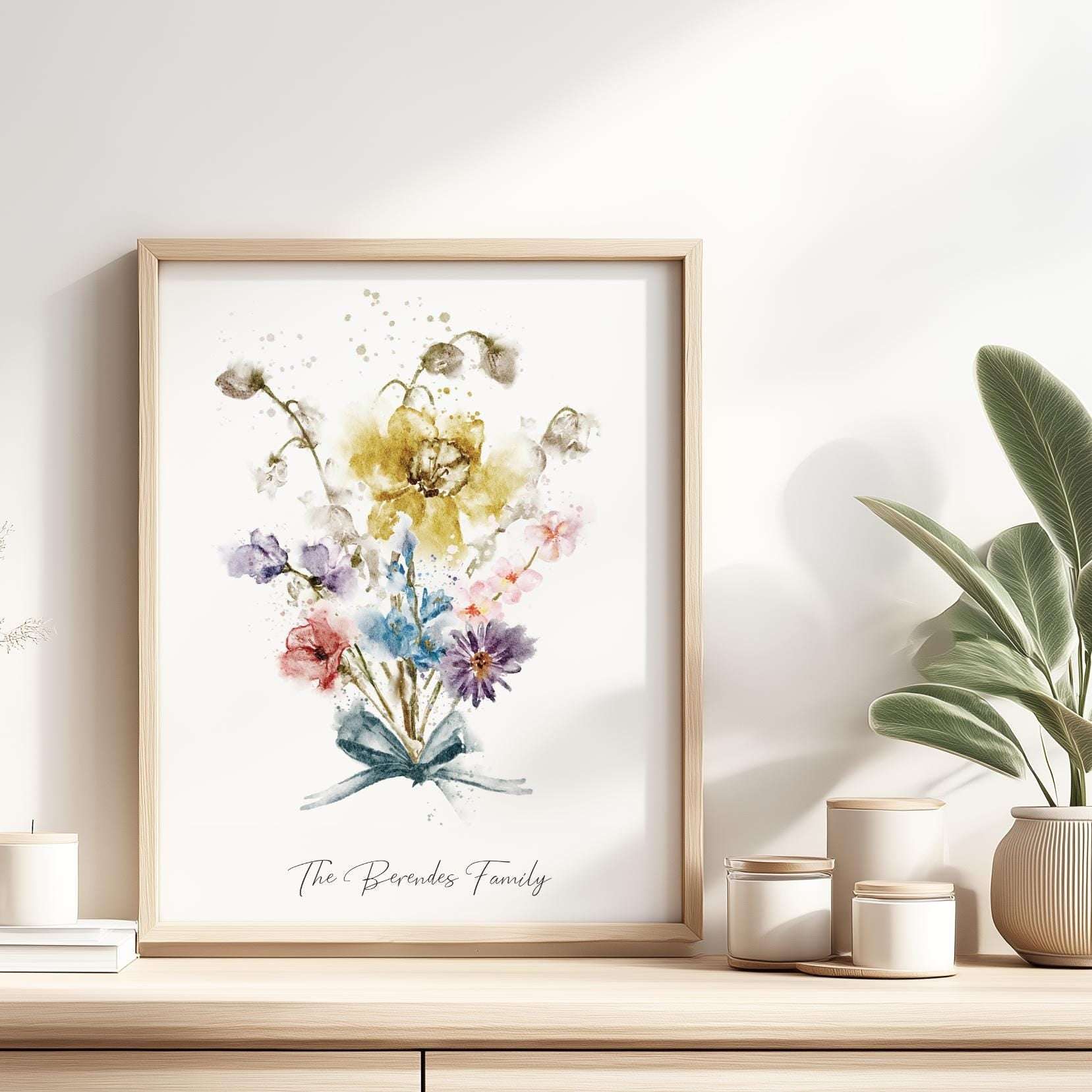 Personalised print with watercolour birth month flowers in a 'grandma's garden' arrangement, framed and ready for wall display