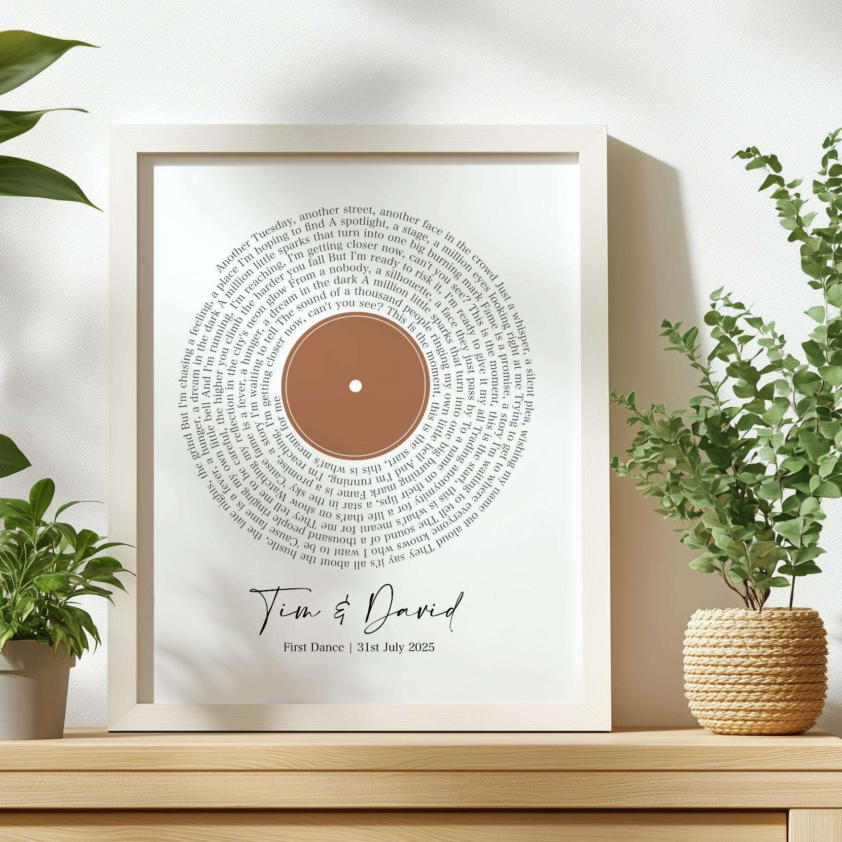 Personalised print featuring song lyrics in a classic spiral vinyl record design, custom text underneath